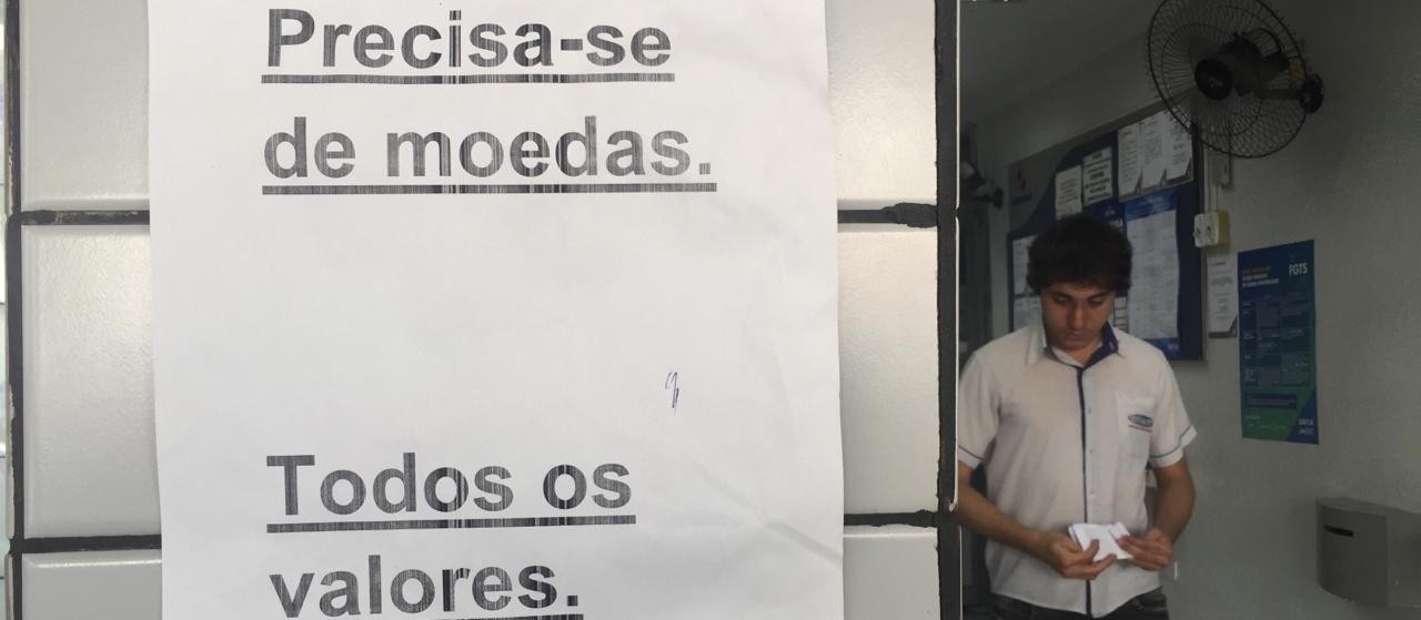 Comércio sofre com a falta de moedas